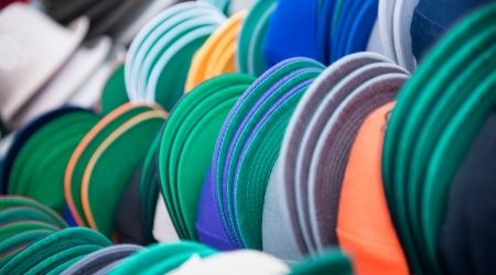 baseball hats stored together