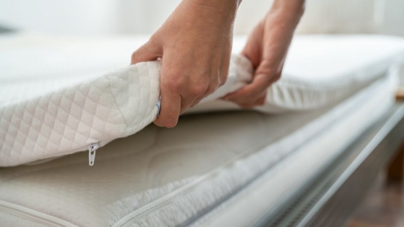mattress topper being stored