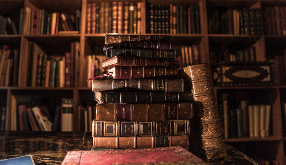 old books stacked in library