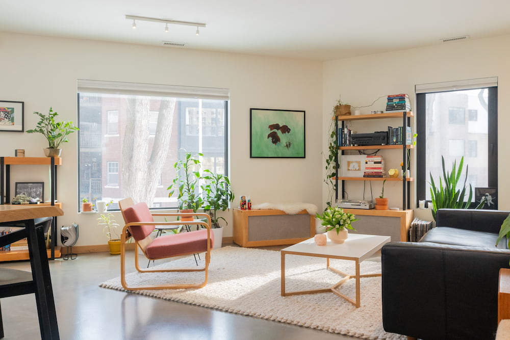 how to make a room look bigger with furniture arrangement