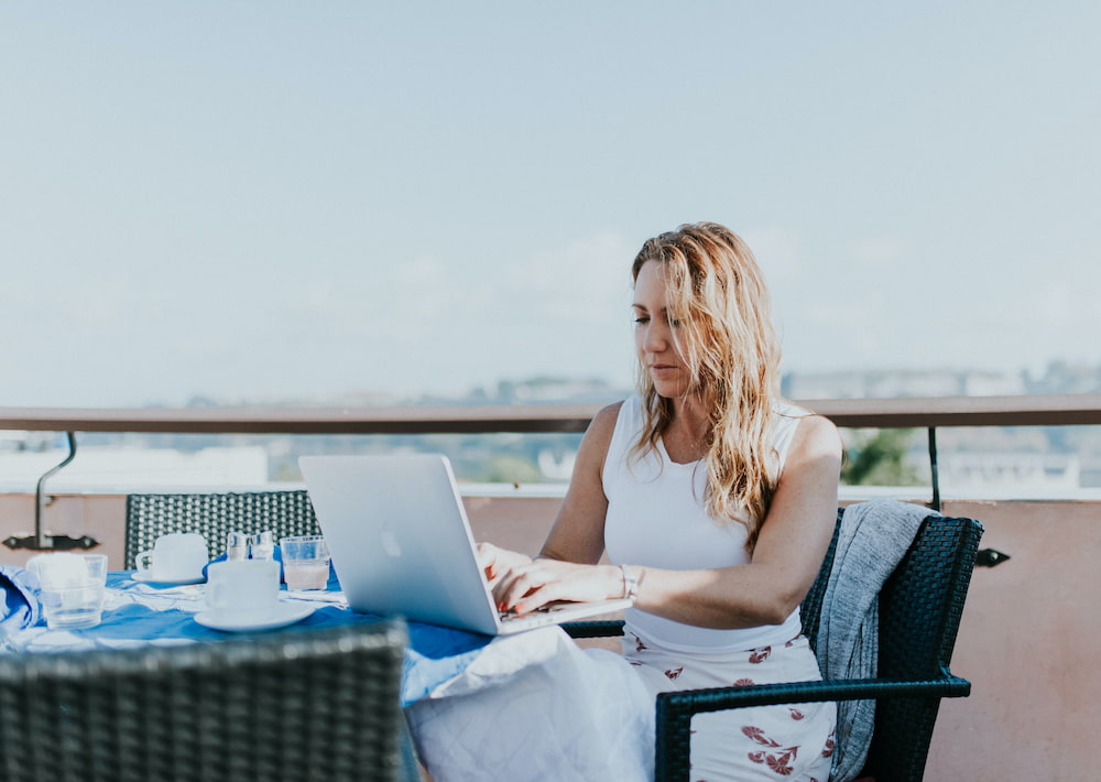 A digital nomad works from an open air cafe in Cuba.