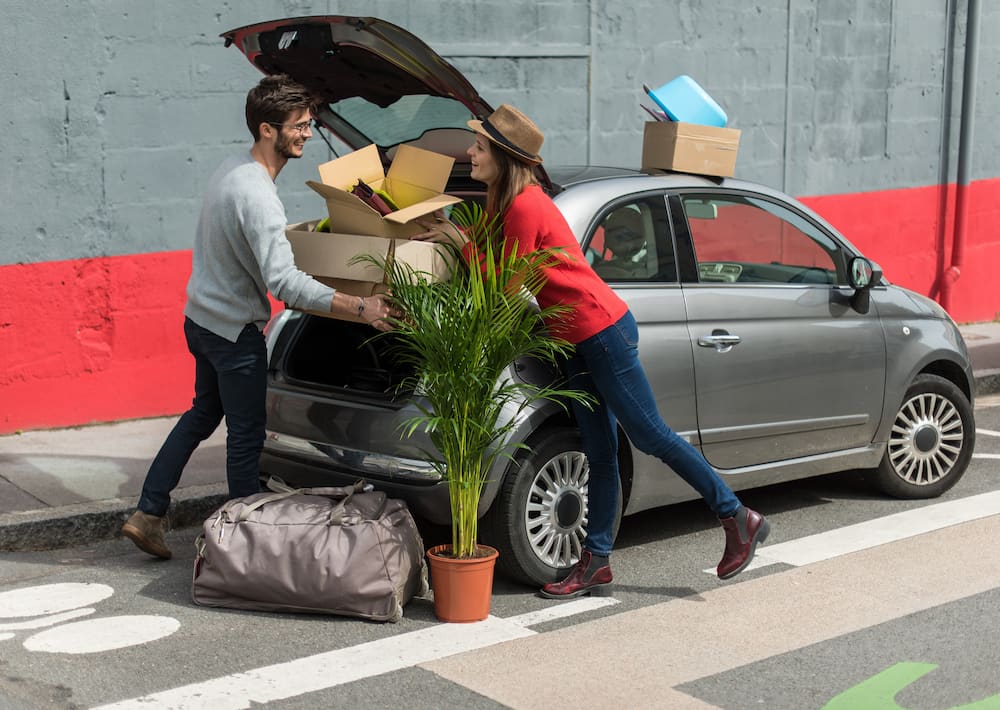 couple packing a vehicle